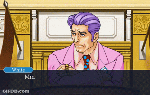 A Man In A Pink Suit And Tie Is Sitting In A Courtroom With The Words White Mm On The Bottom Left GIF