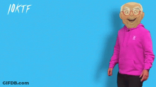 A Man In A Pink Sweatshirt Points To The Word Thursday GIF