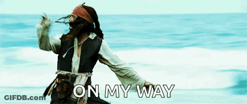 A Man In A Pirate Costume Is Dancing On The Beach With The Words On My Way Written Below Him GIF