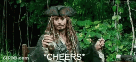 A Man In A Pirate Costume Is Sitting In A Chair Holding A Glass Of Wine And A Cigarette . GIF