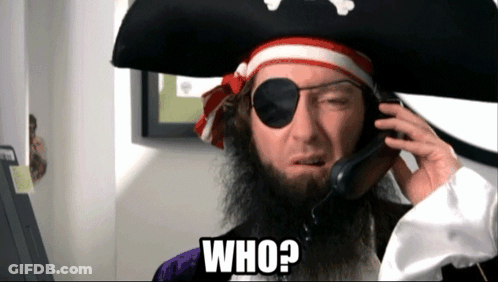 A Man In A Pirate Costume Is Talking On A Cell Phone And Says Who ? GIF