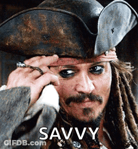 A Man In A Pirate Hat Has The Word Savvy Written On His Face GIF