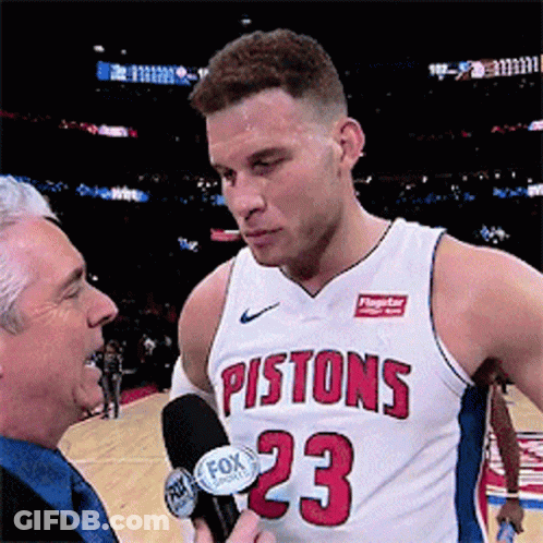 A Man In A Pistons Jersey Is Being Interviewed By A Fox Reporter GIF