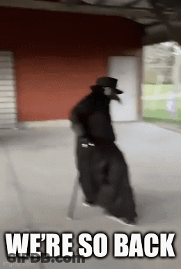 A Man In A Plague Doctor Costume Is Walking Down A Sidewalk With The Words `` We 'Re So Back '' . GIF