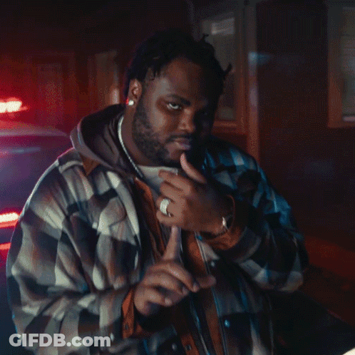 A Man In A Plaid Jacket Says I Ain T Goin ' GIF