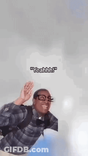 A Man In A Plaid Shirt And Glasses Is Flying Through The Air . GIF