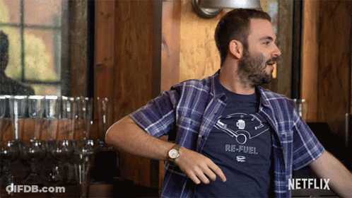 Man In Plaid Shirt With Re-Fuel Shirt GIF