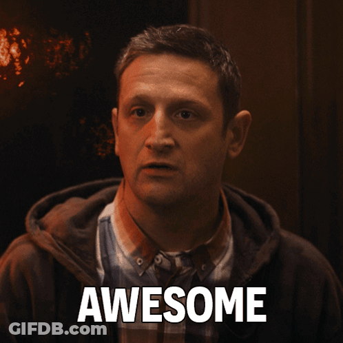A Man In A Plaid Shirt Has The Word Awesome Above His Head GIF