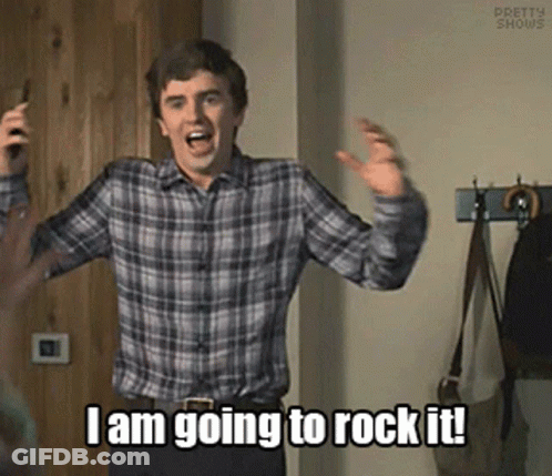 A Man In A Plaid Shirt Is Dancing And Saying I Am Going To Rock It ! GIF