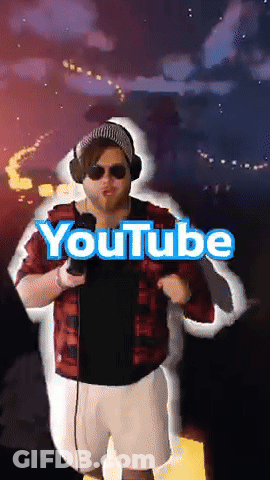 A Man In A Plaid Shirt Is Holding A Microphone And The Word Youtube Is On The Screen Behind Him GIF