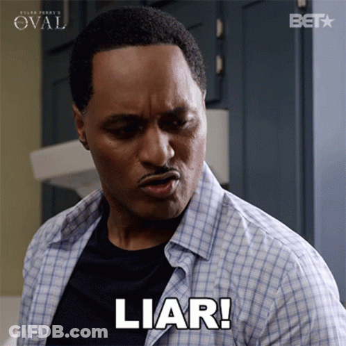 A Man In A Plaid Shirt Is Making A Face And Saying Liar GIF