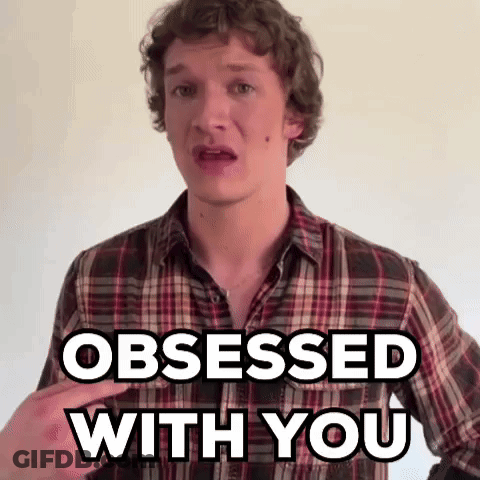 A Man In A Plaid Shirt Is Obsessed With You . GIF