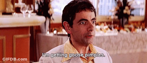 A Man In A Plaid Shirt Is Saying I 'M Getting Goose Pimples . GIF