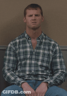 A Man In A Plaid Shirt Is Sitting Down With The Words " I Hate Change " Written Below Him GIF