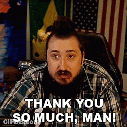 A Man In A Plaid Shirt Is Sitting In A Chair And Saying Thank You So Much Man GIF