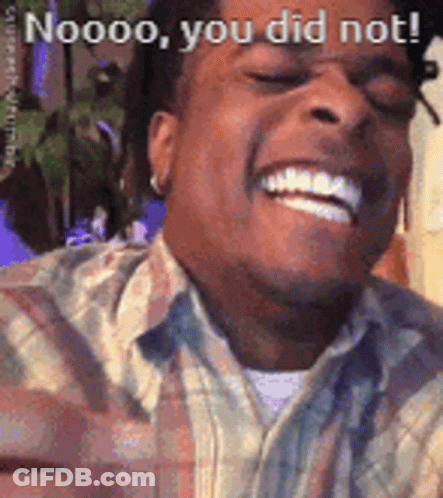 A Man In A Plaid Shirt Is Smiling And Says Noooo You Did Not GIF
