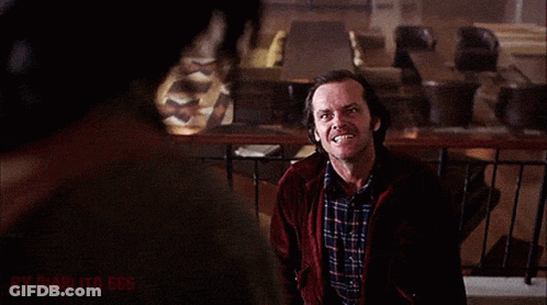 A Man In A Plaid Shirt Is Smiling While Standing Next To Another Man With The Words By Diablito 666 Visible GIF