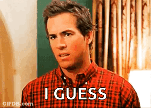 A Man In A Plaid Shirt Is Standing In A Room And Says `` I Guess '' . GIF