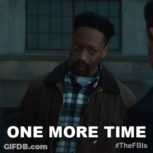 A Man In A Plaid Shirt Is Standing Next To A Sign That Says " One More Time " GIF
