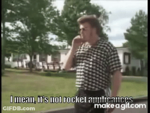 A Man In A Plaid Shirt Is Talking On A Cell Phone . GIF
