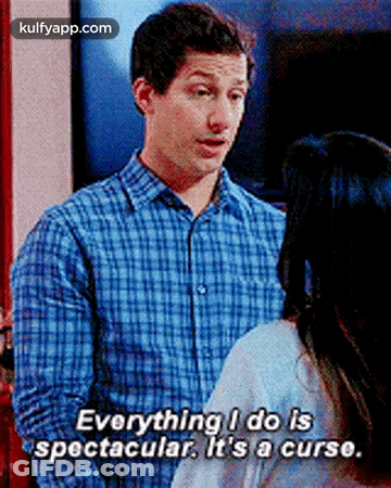 A Man In A Plaid Shirt Is Talking To A Woman And Saying Everything I Do Is Spectacular It 'S A Curse GIF