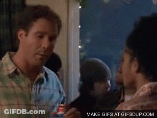 A Man In A Plaid Shirt Is Talking To A Woman In A Crowd . GIF