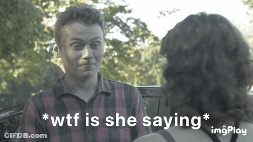 A Man In A Plaid Shirt Is Talking To A Woman Who Is Saying " Wtf Is She Saying * " GIF