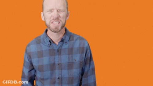 A Man In A Plaid Shirt Points At The Camera With The Words Let 'S Go GIF