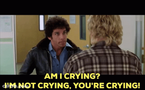 A Man In A Plaid Shirt Says " Am I Crying " While Talking To Another Man In A Leather Jacket GIF