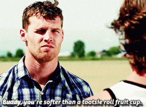 A Man In A Plaid Shirt Says Buddy You 'Re Softer Than A Tootsie Roll Fruit Cup . GIF