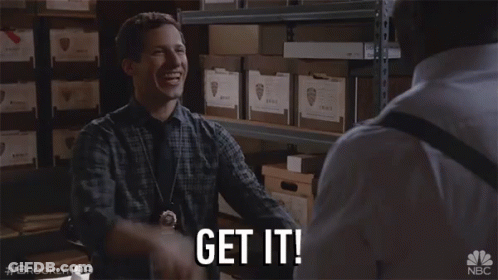 A Man In A Plaid Shirt Says Get It In A Warehouse GIF