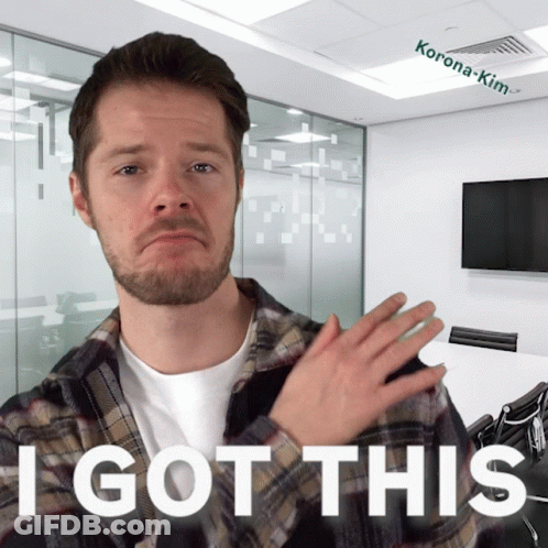 A Man In A Plaid Shirt Says " I Got This " In Front Of A Conference Room GIF