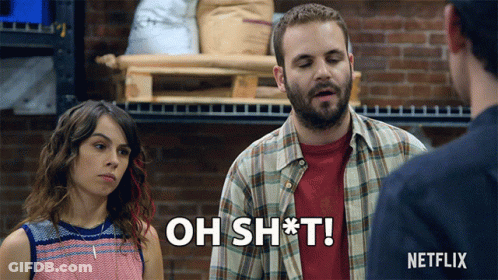 Man In Plaid Shirt Says Oh Sh T Next To Woman GIF