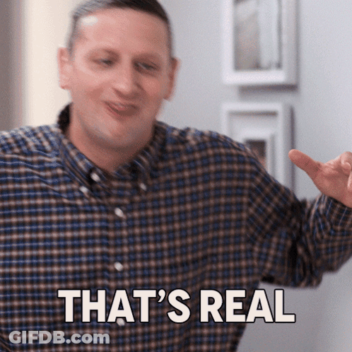 A Man In A Plaid Shirt Says " That 'S Real " While Pointing GIF