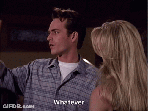 A Man In A Plaid Shirt Says Whatever While Standing Next To A Blonde Woman GIF
