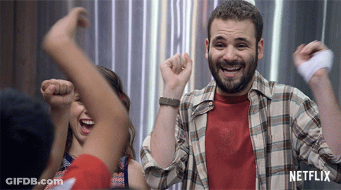Man In Plaid Shirt With Netflix Logo GIF