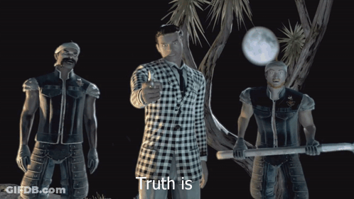 A Man In A Plaid Suit Is Pointing At The Camera With The Words " Truth Is " Above Him GIF