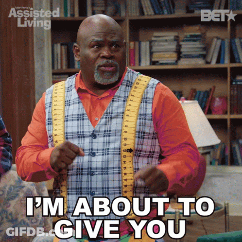 A Man In A Plaid Vest And Suspenders Says I 'M About To Give You GIF