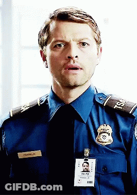 A Man In A Police Uniform Has A Name Tag That Says Franklin On It GIF
