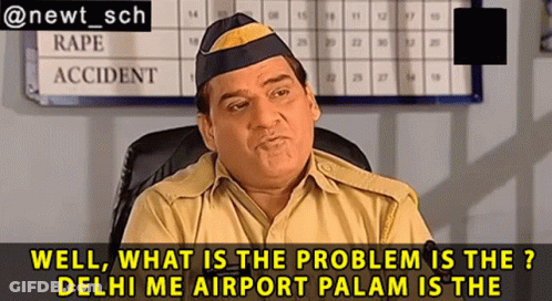 A Man In A Police Uniform Is Sitting In Front Of A Sign That Says " Rape Accident " GIF