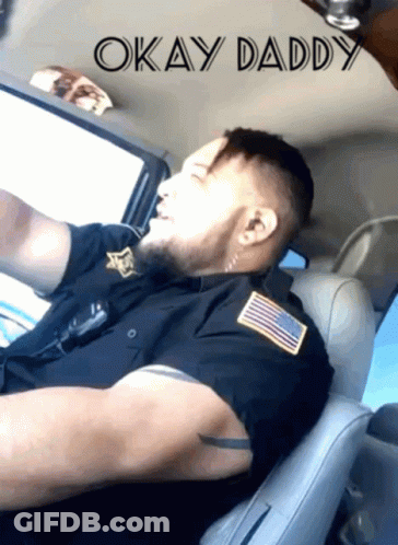 A Man In A Police Uniform Is Sleeping In The Back Seat Of A Car With The Words Okay Daddy Above Him GIF