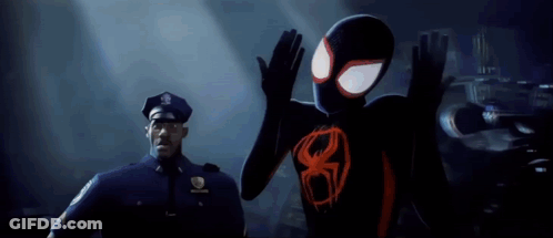 A Man In A Police Uniform Is Standing Next To A Spider Man In A Black Suit . GIF