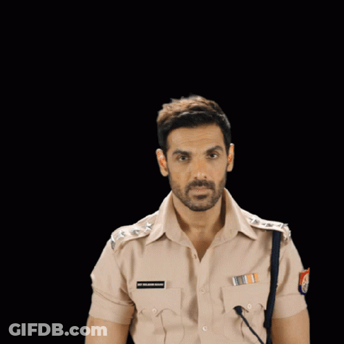 A Man In A Police Uniform Salutes With A Name Tag That Says S.p. Vijayan Ahmad GIF