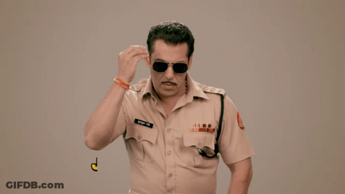 A Man In A Police Uniform Says " Jwala Hai Jwala " In Yellow Letters GIF