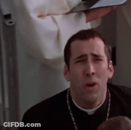 A Man In A Priest 'S Robe Is Holding A Bible In His Hand And Making A Funny Face . GIF