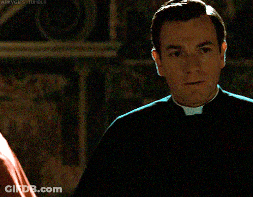 A Man In A Priest 'S Uniform Is Standing In A Dark Room With A Watermark That Says Arkvgfs Tumblr GIF