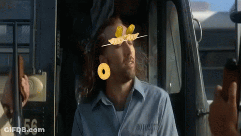 A Man In A Prison Uniform With The Number 56 On The Back GIF