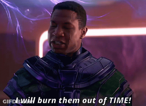 A Man In A Purple And Green Suit Says I Will Burn Them Out Of Time GIF