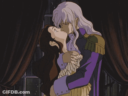 Man In Purple Coat Hugging Woman GIF