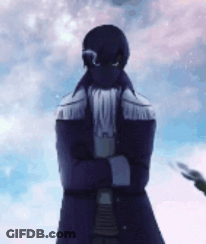 A Man In A Purple Coat Is Standing With His Arms Crossed . GIF